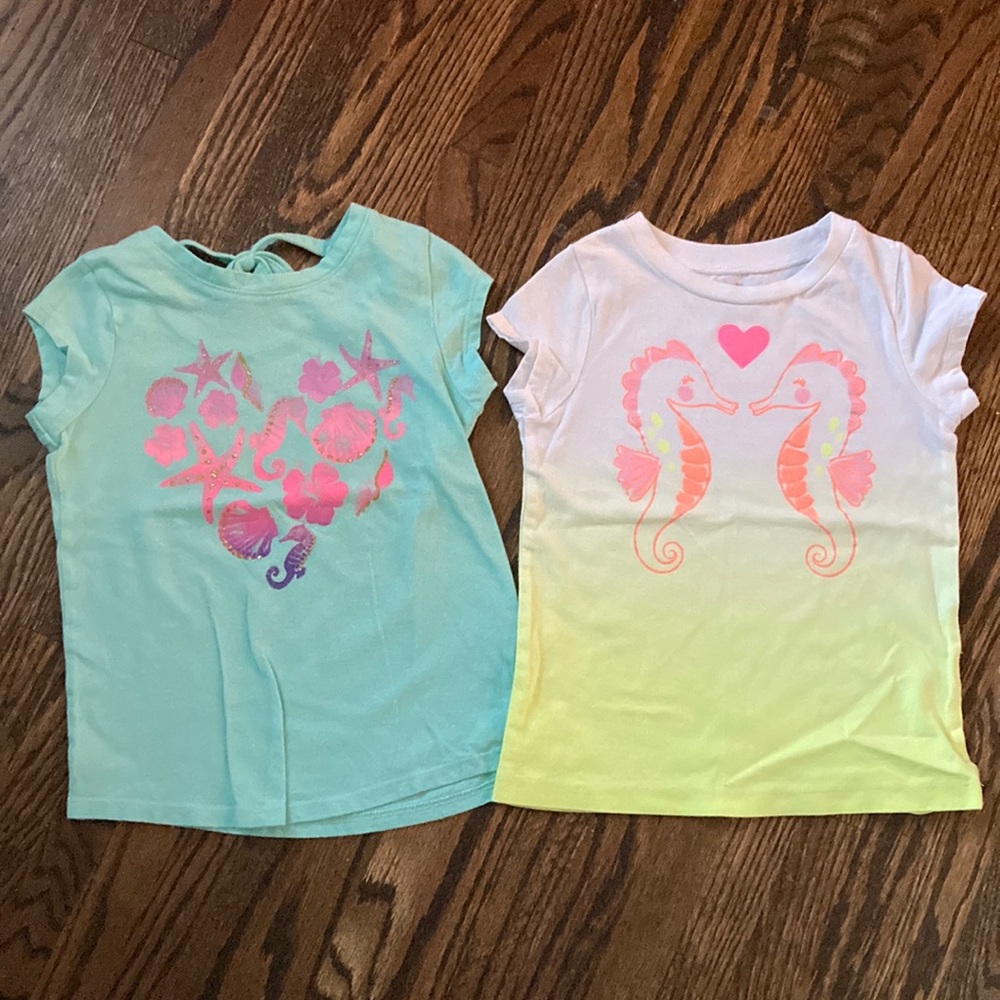 Pair of sea theme / seahorse shirts